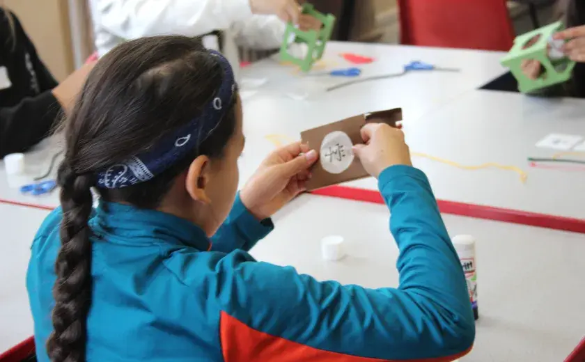 Year 5 and 6 pupils creating Chinese lanterns