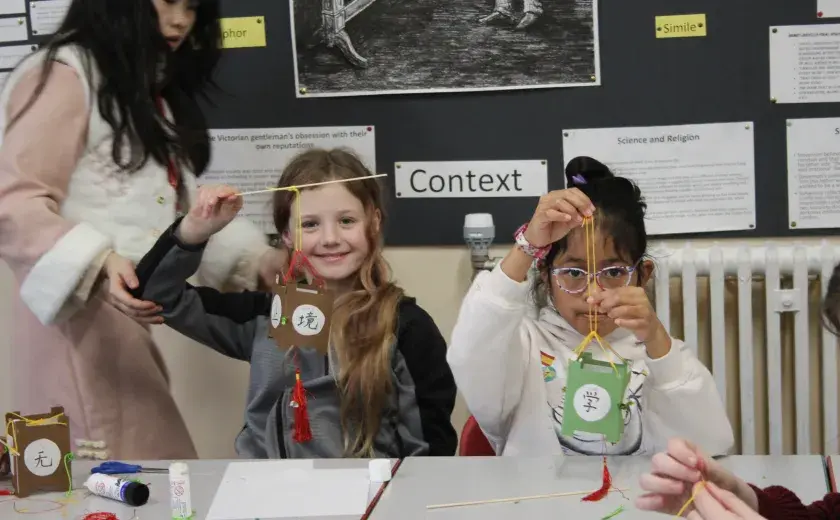 Year 5 and 6 pupils creating Chinese lanterns