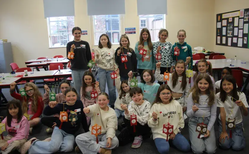 Year 5 and 6 pupils creating Chinese lanterns